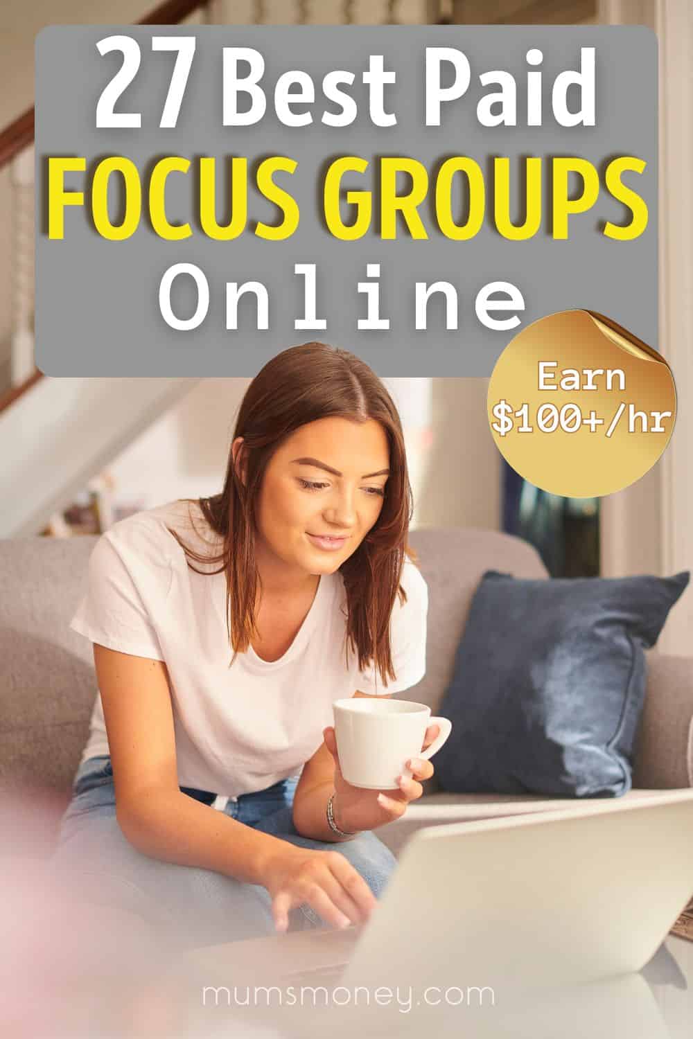 Woman with laptop and holding a white cup