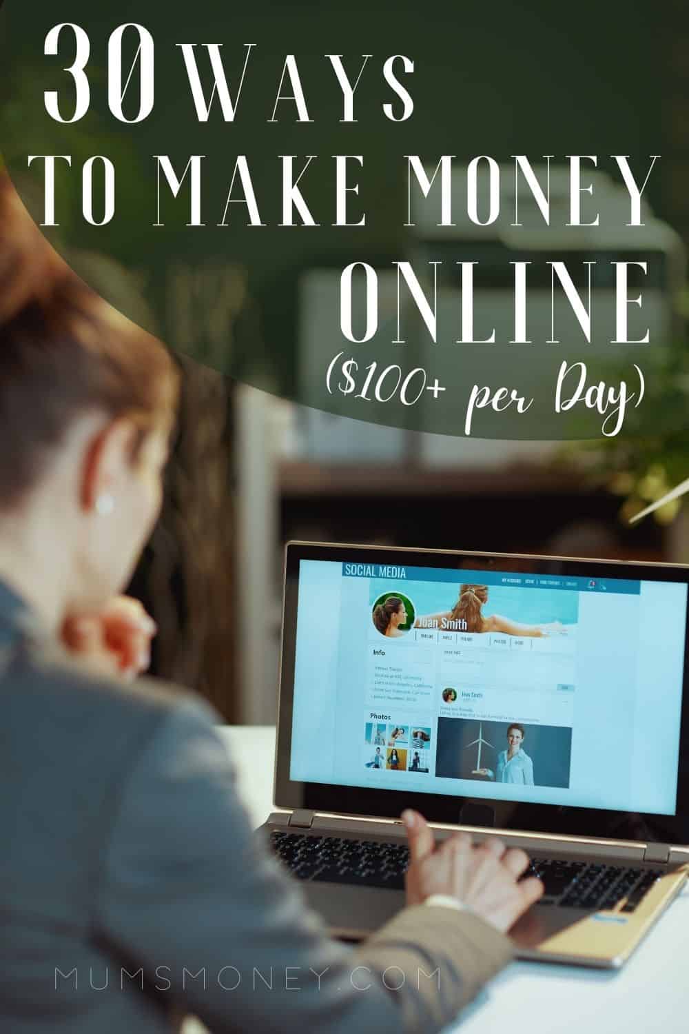 Woman working online looking at her laptop