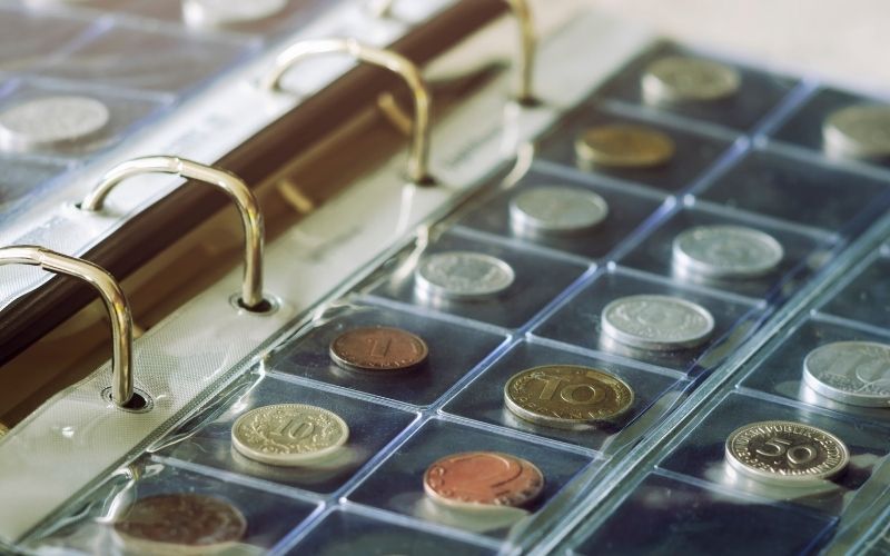 coins holding in blisters in coin album