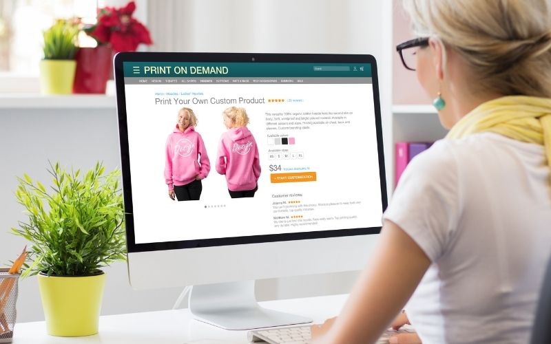 woman creating her own products by using print on demand service online