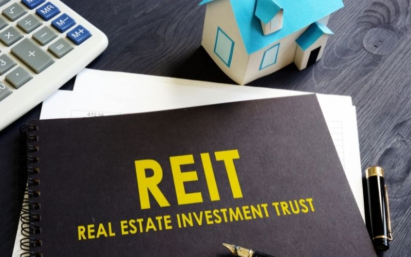 real estate investment trusts on an office desk