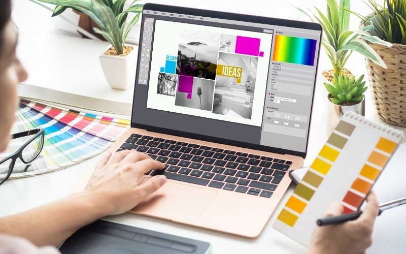 graphic designer woman working on a laptop