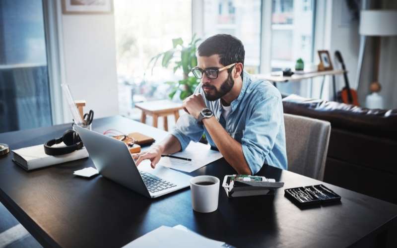 young man working from home