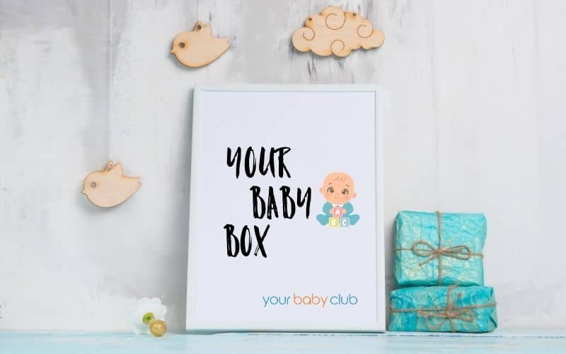 three gift boxes with one big white box with label Your Baby Box on it