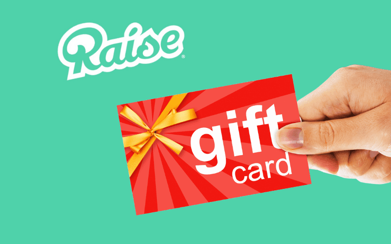 A hand holding a gift card